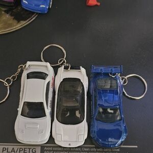 Blue and White Toy Car Keychain Set